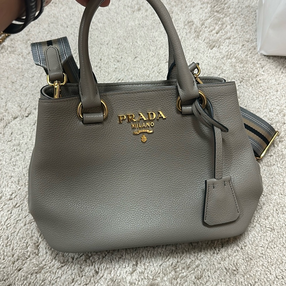 Prada gey bag medium size in mint condition. Only wore couple times.